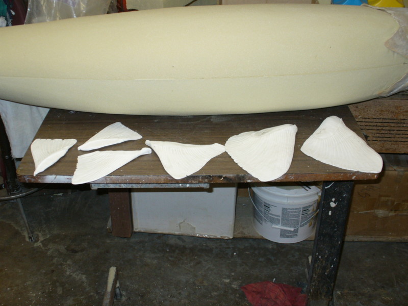 Fins cast and
                        body carved