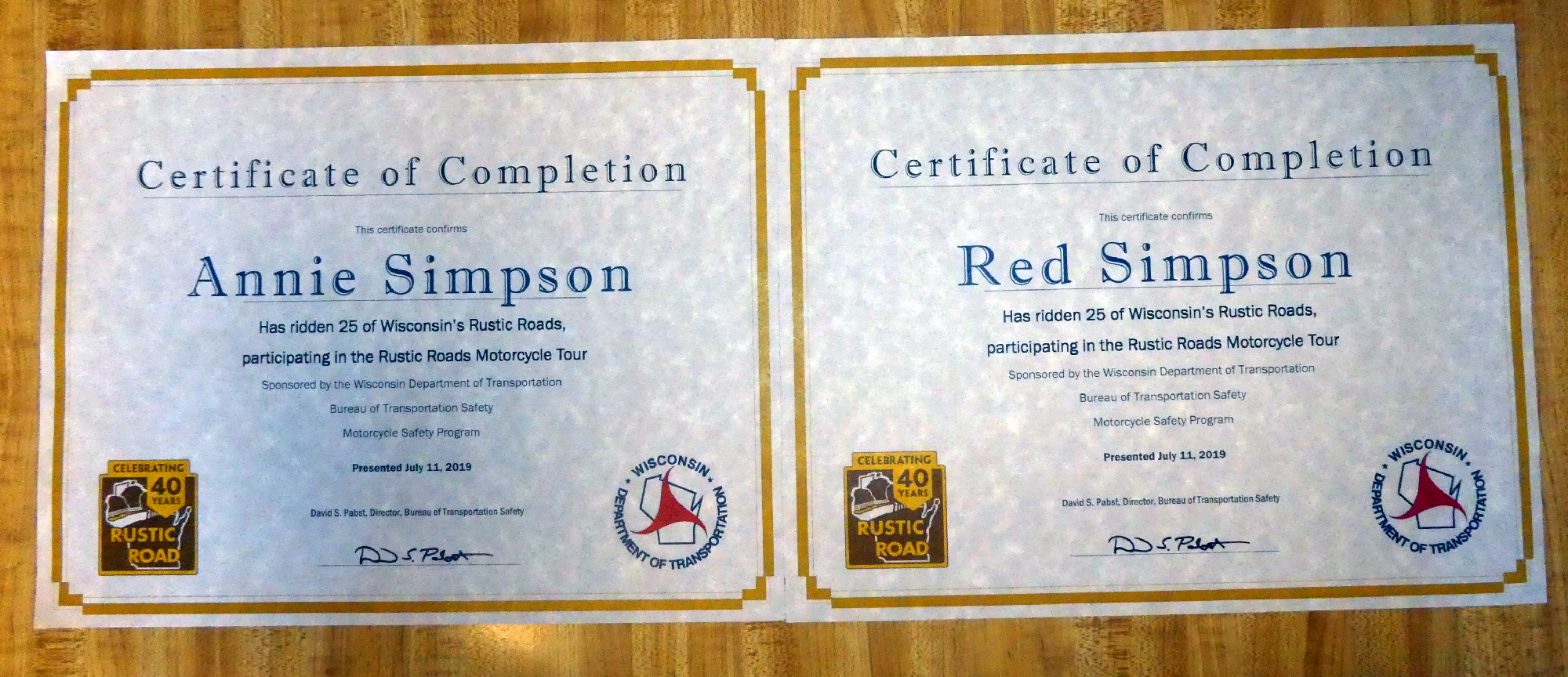 The "Official
                " Certificats of Completion for riding 25 Rustic
                Roads